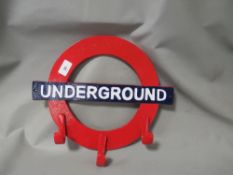 **An underground sign coat rack**