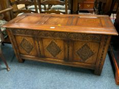 A 20th century carved oak blanket box W 109 cm