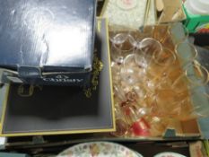 A tray of assorted glassware to include a boxed Baban Globe Whiskey decanter set