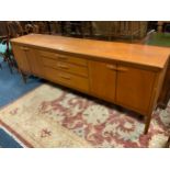 A mid century teak sideboard W 214 cm