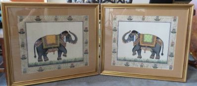 A PAIR OF 20TH CENTURY INDIAN SCHOOL STUDIES OF ELEPHANTS IN CEREMONIAL REGALIA, with decorative