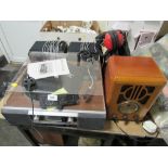 A Neostar CD recorder music system with encode together with a vintage effect radio, portable DVD