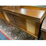 A retro mahogany sideboard with Sony Technics seperates and a speaker cabinet