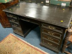 A vintage dark oak twin pedestal desk W 137 cm