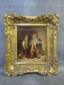 IN THE STYLE OF AUGUSTUS E, MULREADY (XIX). Kitchen interior with mother and children, unsigned, oil