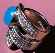 Schmuckring "Ricarda M.", blauer Centerstein und viele kl. blaue Steinchen, RG 58, 21 gr.