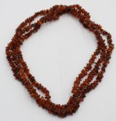 sehr lange endlos gearbeitete Bernsteinkette, 92,2gr.