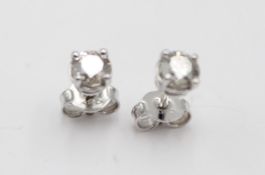 Paar Ohrstecker, 14ct WG, natürliche Diamanten, zus. 0,,8gr., ca. D-0,4cm