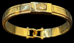 goldfarbener Armreif "Fossil", neuwertig