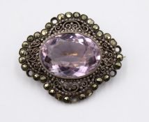 Silber-Brosche um 1920, Amethyst und Markasitenbesatz (einge fehlen), ca. 9,6gr., ca. 3 x 3cm