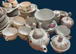 ca. 60 tg. Teeservice mit handgemalten Friesenrosen, mit Stövchen, Schalen, Teedosen etc. usw., 2 T