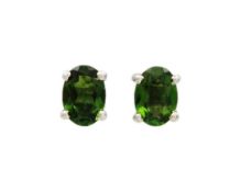 A pair of silver chrome diopside stud earrings.