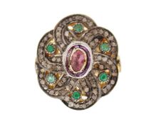 A silver gilt, pink tourmaline, emerald, and diamond flower-shaped dress ring.