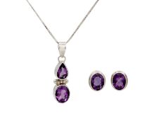 A silver set of an amethyst pendant necklace and a pair of stud earrings, boxed.