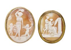Two large shell cameo brooches.