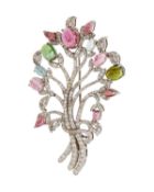 A silver, multicoloured tourmaline, and diamond flower bouquet motif brooch.