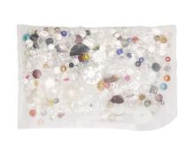 A parcel of mixed loose gemstones.