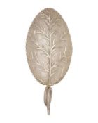 A George III silver caddy spoon in the form of a leaf by Joseph Willmore.