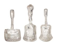 A selection of three 19th century silver caddy spoons with bright cut shovel shaped bowls.