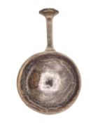 A E JONES - An Arts & Crafts silver caddy spoon.