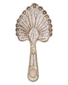 A rare George III silver filigree caddy spoon.