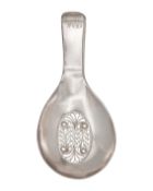 A small Georgian silver caddy spoon with filigree decoration by Samuel Pemberton.