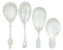 A selection of four Victorian silver caddy spoons.