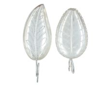 Two George III silver leaf-shaped tea caddy spoons.