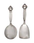 GEORG JENSEN - Two Danish silver caddy spoons in Acorn pattern.