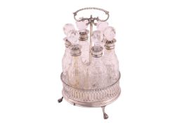 A Victorian silver and cut-glass cruet set on stand, stand hallmarks rubbed, hallmarks to gilt spoon