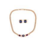 Christian Dior - A gold-plated necklace and earrings suite, the necklace composed of three step-