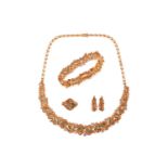 An emerald and diamond parure; comprising a necklace, a bracelet, a pair of earrings and a