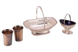 An Edwardian silver cake basket, of rectangular form with reeded borders, the basket featuring a gad