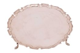 A silver salver by Edward Barnard & Sons Ltd., London 1930, circular form with mould piecrust ri