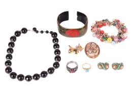 A collection of jewellery, to include a ring set with a simulated turquoise cabochon of rectangular 