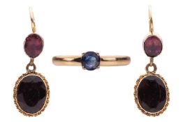 A sapphire ring and a pair of paste drop earrings; the ring featuring a round-cut sapphire of approx