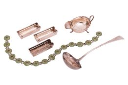 A George III silver Old English pattern soup ladle, a silver sauce boat, a set of three silver ashtr