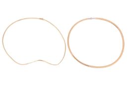 Two snake chains; a bi-colour metal snake chain of approximately 4mm width, 42.5 cm length, and anot