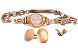 An 18ct gold lady’s wristwatch with rolled-gold strap, Swiss hallmark, accompanied by a horseshoe ch