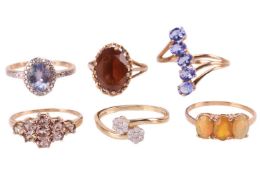 A group of six gem-set rings in 9ct gold; to include a colour-changing garnet lozenge cluster ring i