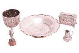 A Burmese bowl, a Burmese casket, a repousse cream jug, a fruit dish by Hamilton of Calcutta and a d