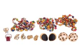 A small collection of costume jewellery in gilt and base metal, to include three strands of polychro