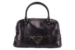 Gucci by Tom Ford - Reins bowling bag in black perforated leather, circa 2000s, double top zipper cl
