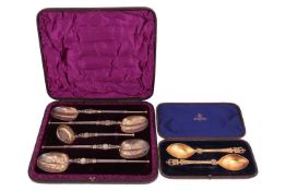 A cased set of silver gilt spoons and sugar sifter modelled as anointing spoons, London 1892, by Fra