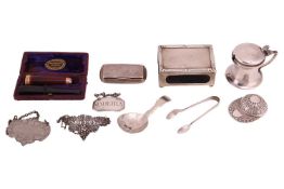 A Victorian silver fiddle pattern caddy spoon, London 1861 by George Adams, a modern silver jockey c