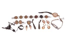 A group lot of cameo jewellery and others to include; a lava stone cameo bracelet, brooch and ring s