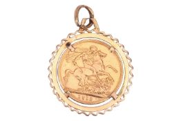 A George V full sovereign in pendant mount, the detachable mount with wired surround to a suspension