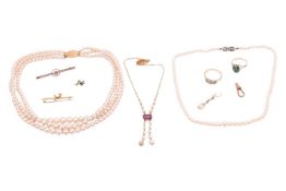 A small group of jewellery items; to include a three-row faux pearl necklace, a faux pearl and purpl