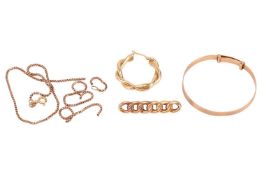 A small group of gold jewellery items; to include a single hoop earring in 18ct gold, a christening 