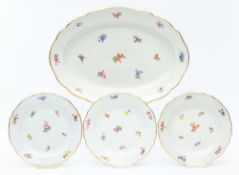 Ovale Plette und drei Teller, Meissen,